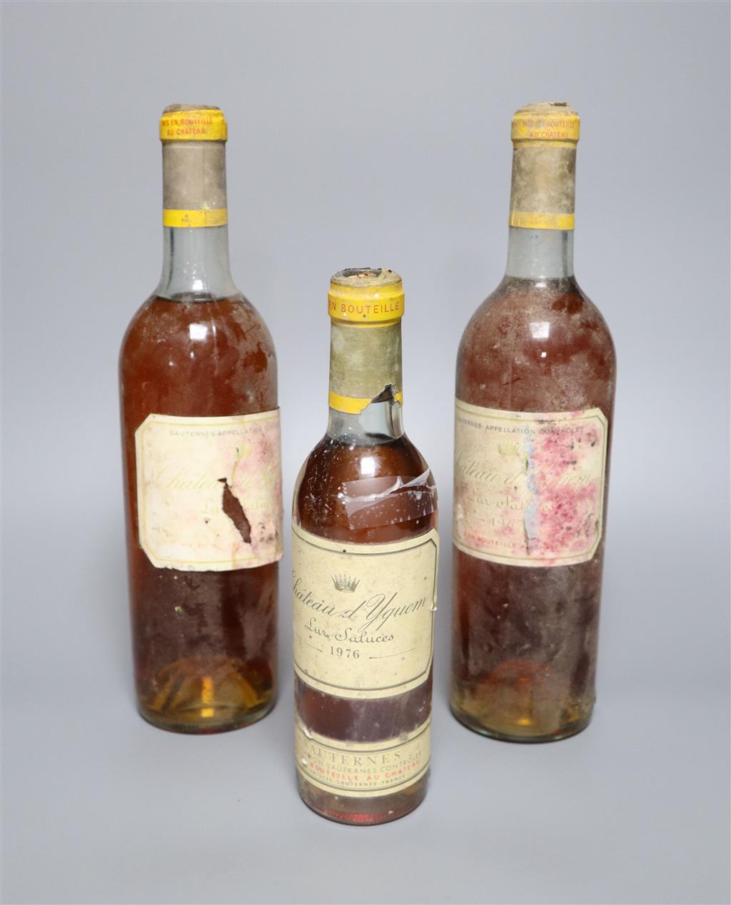 Two bottles of chateau DYquem sauternes 1967-1965, and a 375ml bottle